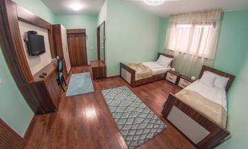 Фото номера Двухместный номер с 2 отдельными кроватями Отель Hotel Coral г. Valea Lupului 5